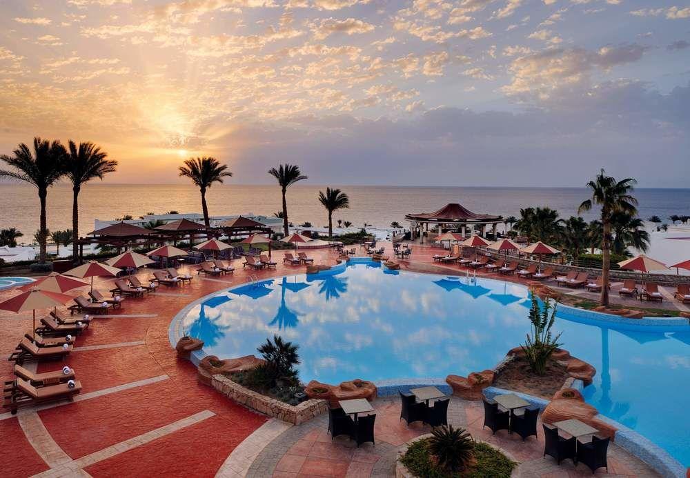Renaissance Sharm El Sheikh Golden View Beach Resort Exterior photo Sunset at the Hilton Sharm El Sheikh