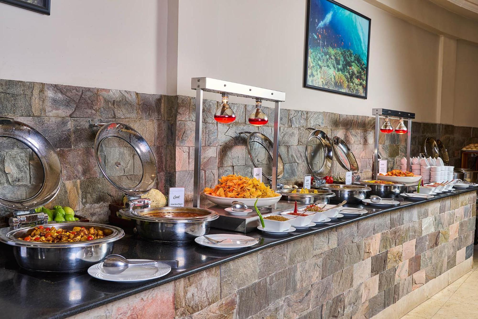 Renaissance Sharm El Sheikh Golden View Beach Resort Exterior photo A buffet at a hotel